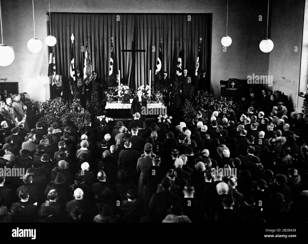 View of the congregation during the consecration speech of the Vicar of the German Evangelical Church, D. Engelke, during the Consecration of the Protestant parish hall in Haselhorst on 06.01.1935. Stock Photo