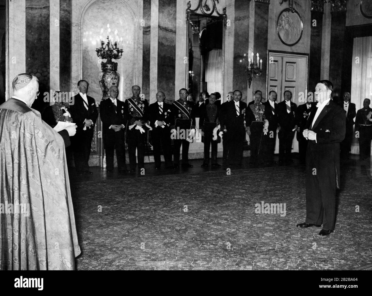 New Year Reception at Adolf Hitler in the house of the president in the Wilhelm street in Berlin on 10.01.1937. Address by the Papal Nuncio Cesare Orsenigo. Stock Photo