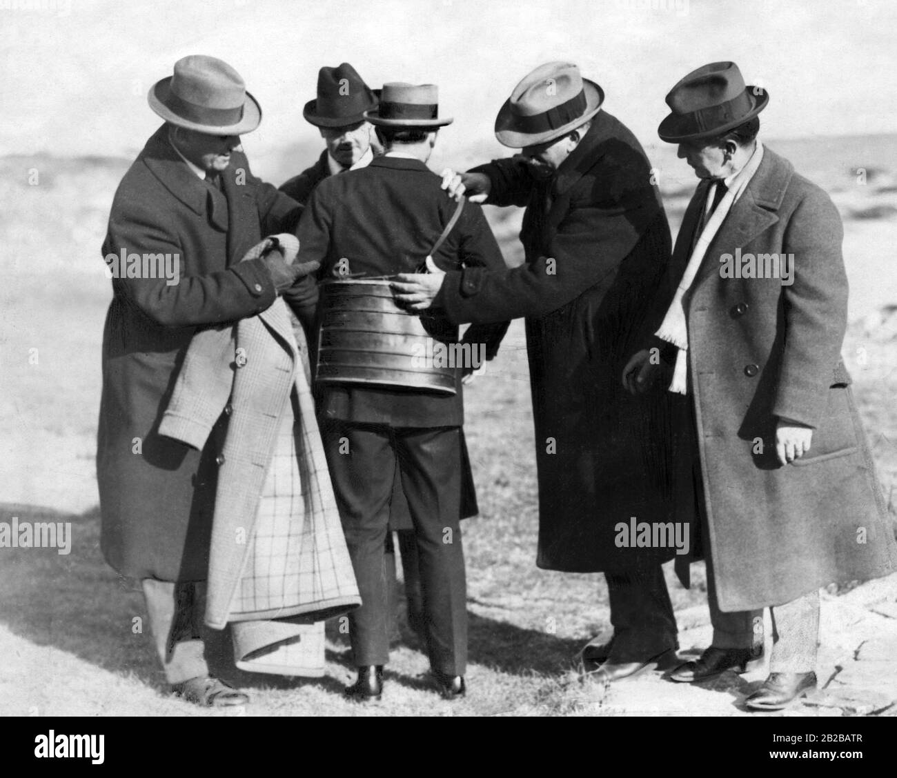 Prohibition: Picture shows a container built to bootleg alcohol under the jacket. Stock Photo