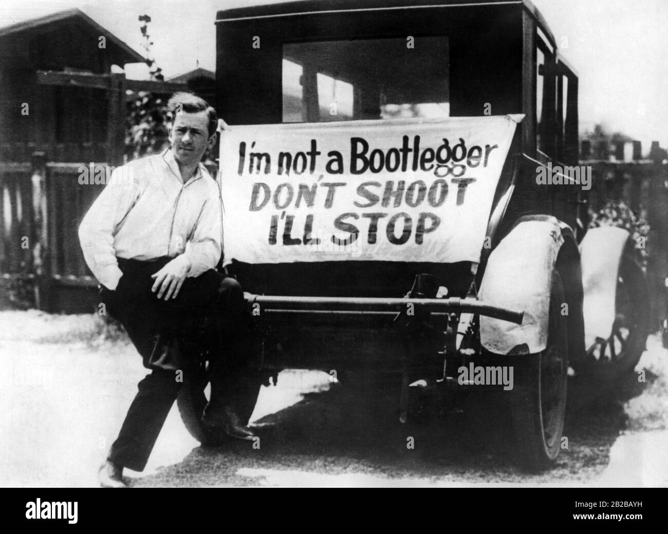 For fear of police, a carpenter from Los Angeles attached a sign on his car that says: 'Do not shoot, I'm not a bootlegger, I'll stop'. Stock Photo