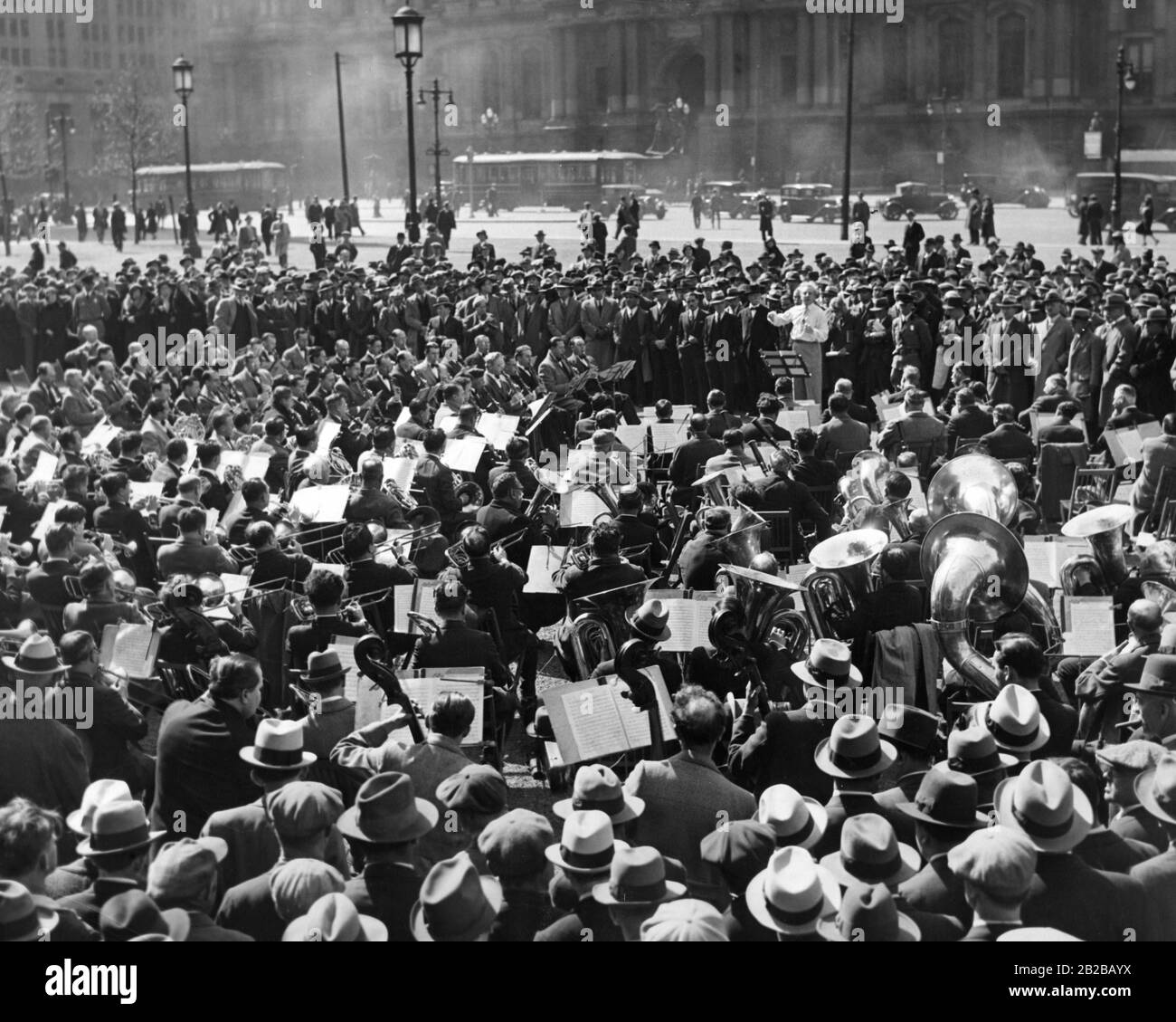 Global economic crisis: Leopold Stokowski conducts a concert by jobless musicians. Stock Photo