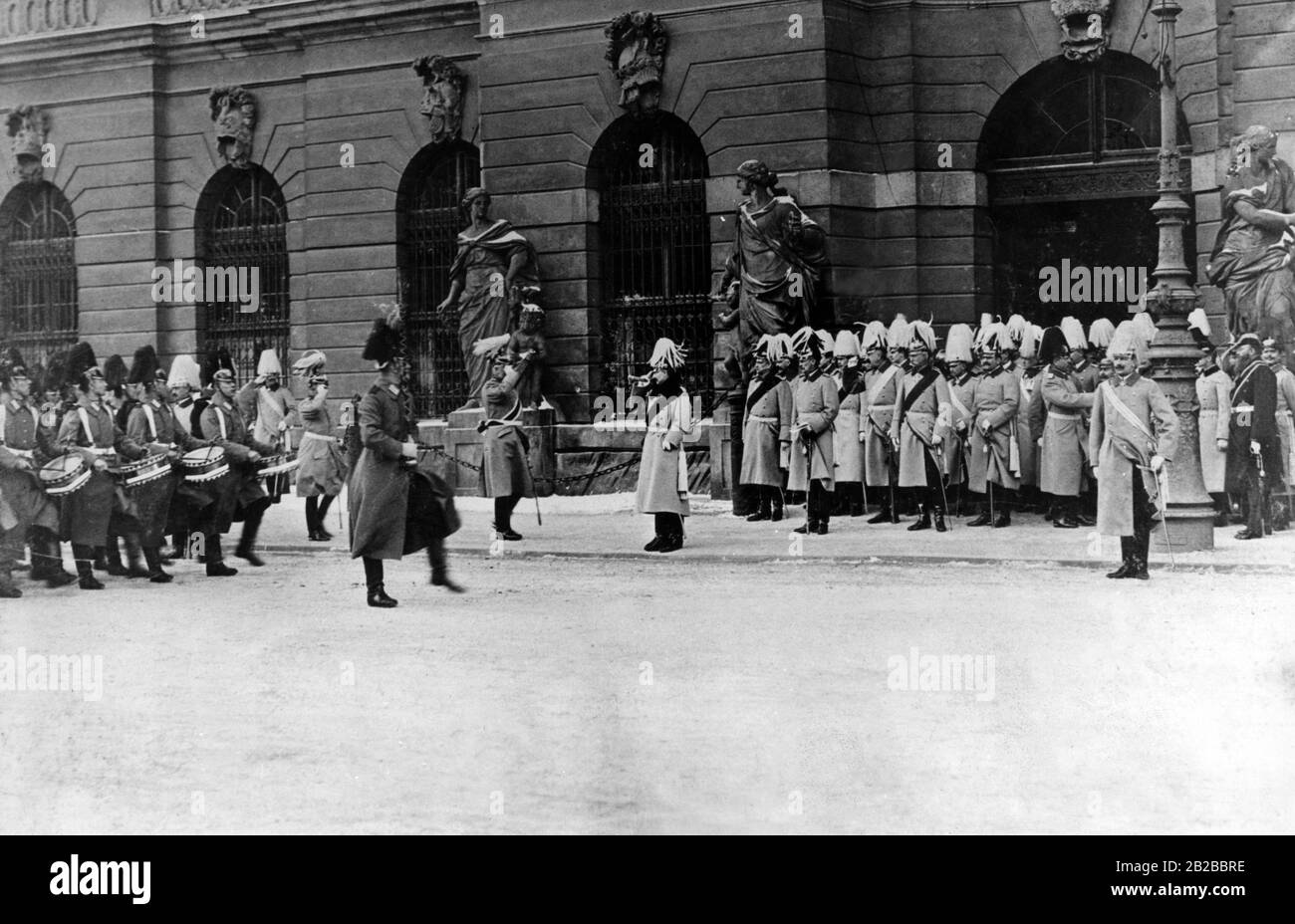 At the Berlin New Year's celebration in 1905, the guard of honour marches in front of the Emperor after the Paroleausgabe (giving out of the password) in the Zeughaus. In the middle of the picture, Wilhelm II saluting. Stock Photo