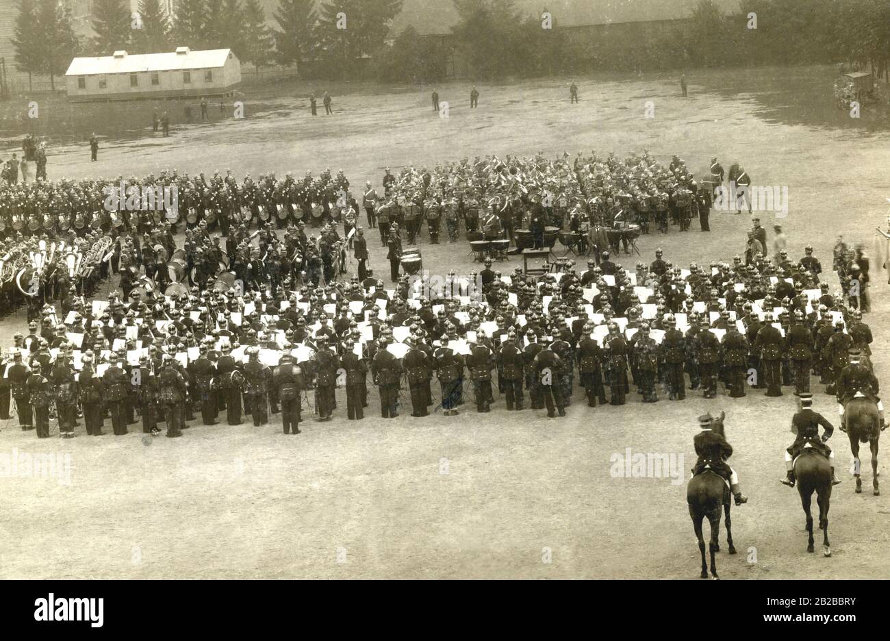 The music corps of the German Imperial Army at the Grosser Zapfenstreich (military ceremony). Undated photo. Stock Photo