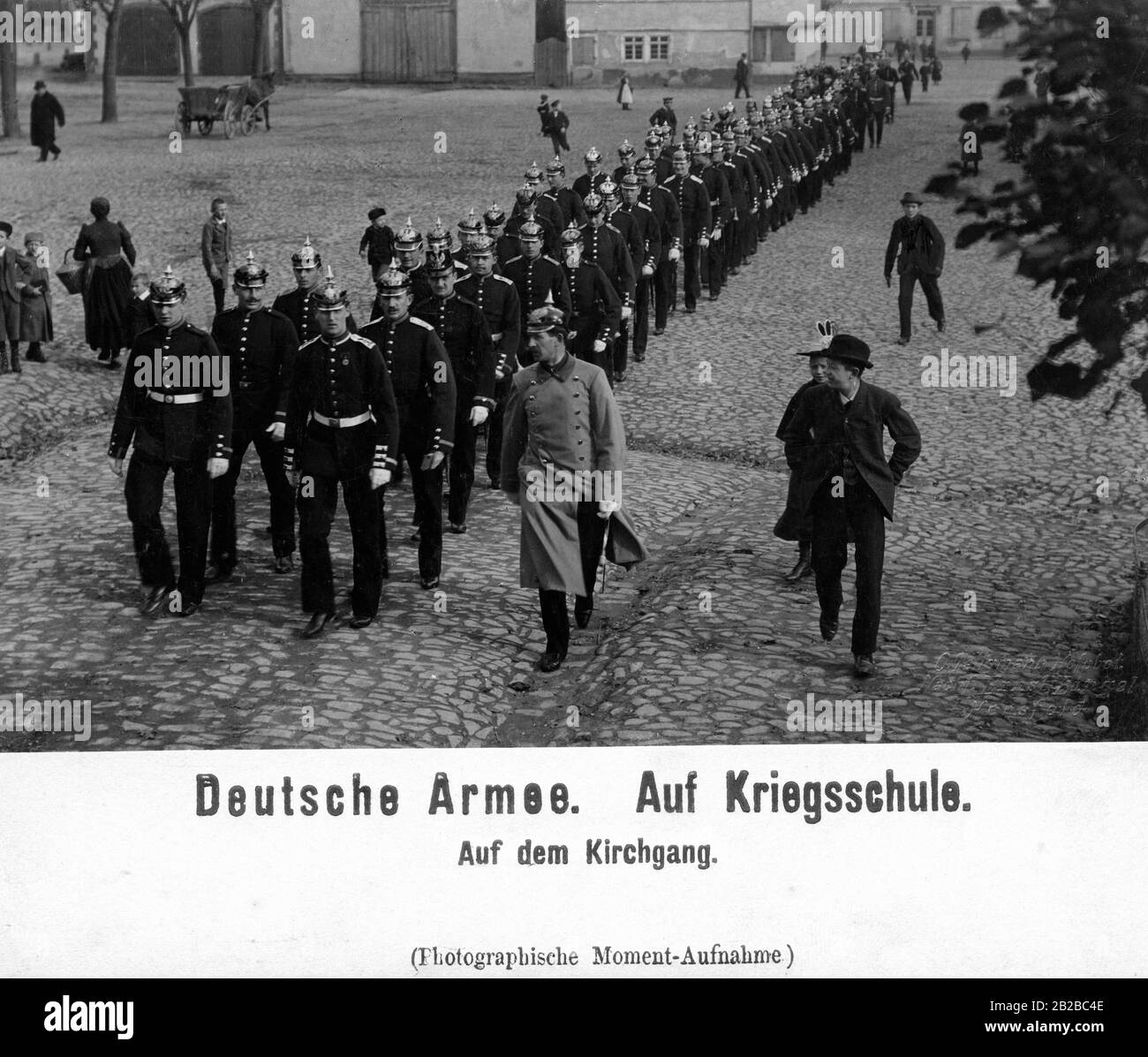 German soldiers march in rank and file to the church during their training at the Kriegsschule (war school). Stock Photo