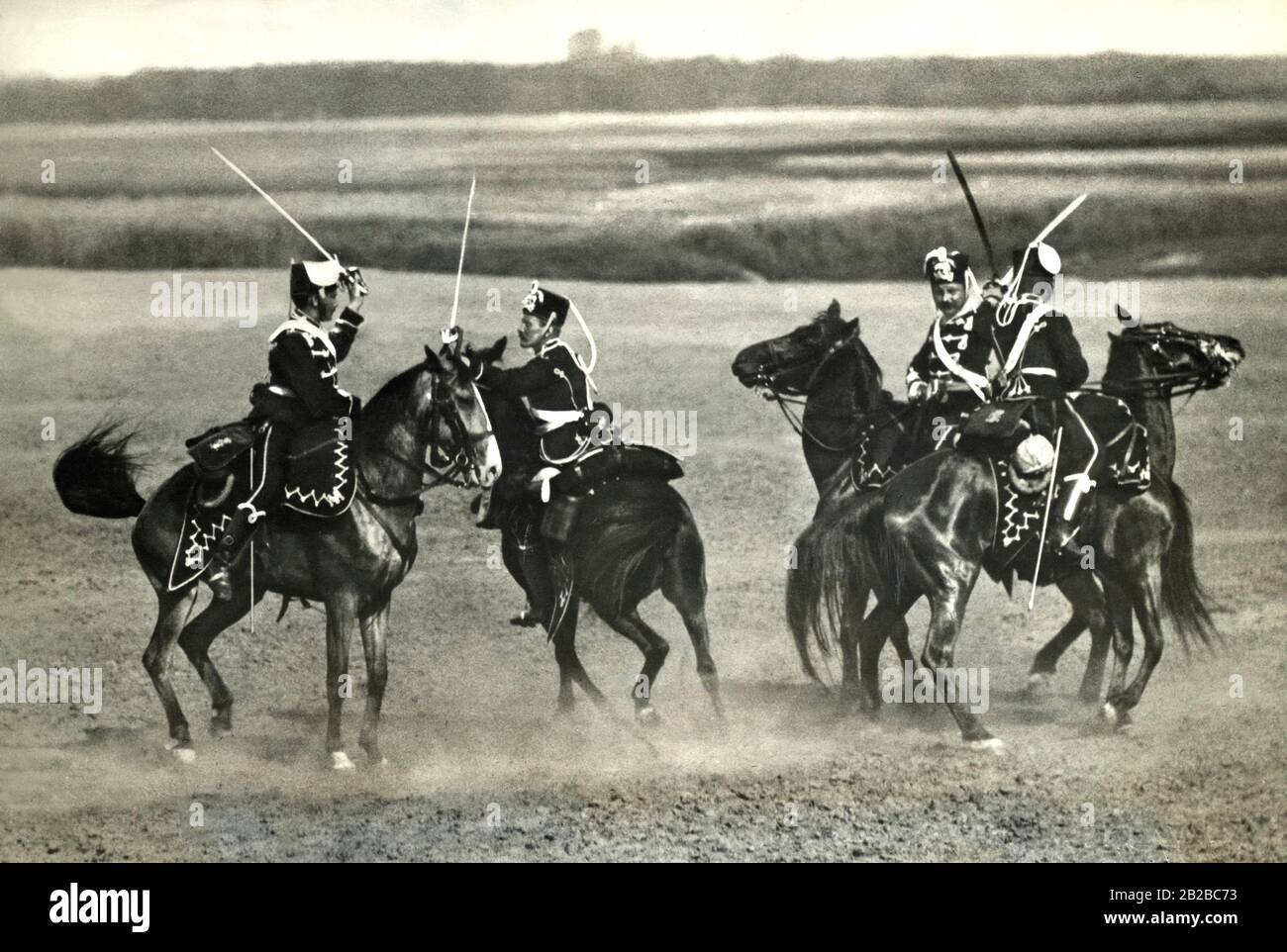 The famous Totenkopfhusaren (Death's Head Hussars), who were stationed in Gdansk, excelled in every manoeuvre with their skills in cavalry combat, although this cavalry training had become an anachronism since the invention of the machine gun and rapid-fire gun. Stock Photo