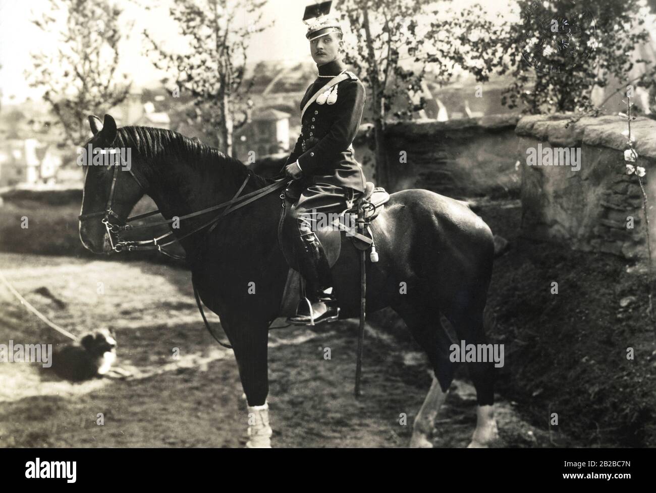 A Uhlan officer in his uniform on his horse. Stock Photo