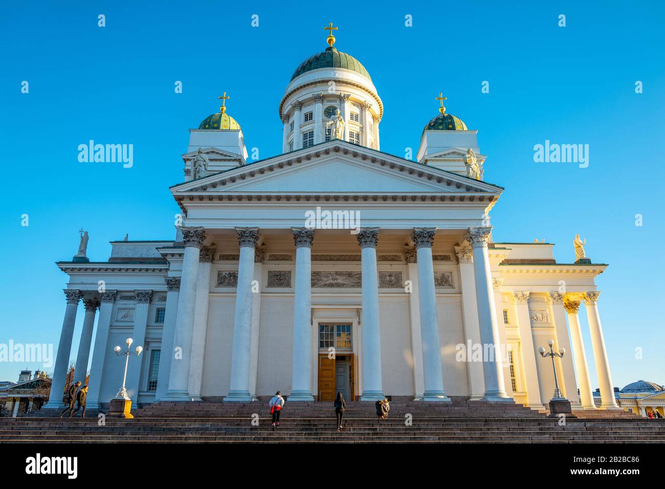 Helsinki, Finland, Visitors on the staircase of the Cathedral seen from Senate Square Stock Photo