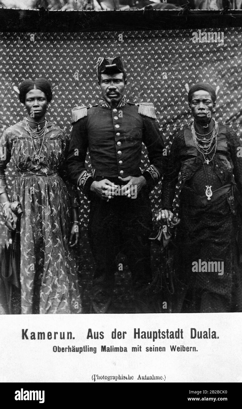 Chief Malimba with his wives in Doula the capital of the former German colony of Cameroon. Stock Photo