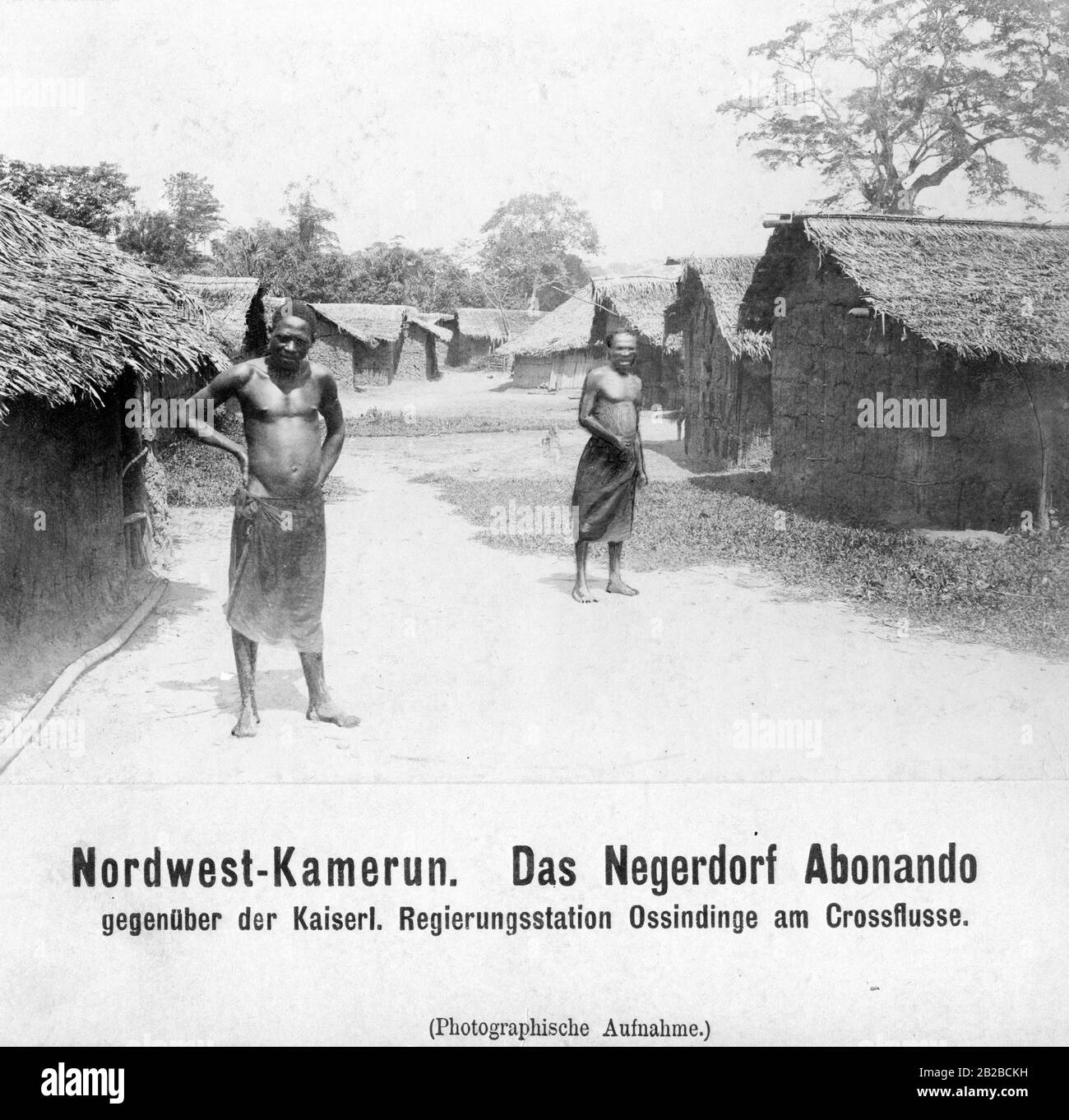 Two locals in the village of Abonando in the German colony of Cameroon. Stock Photo