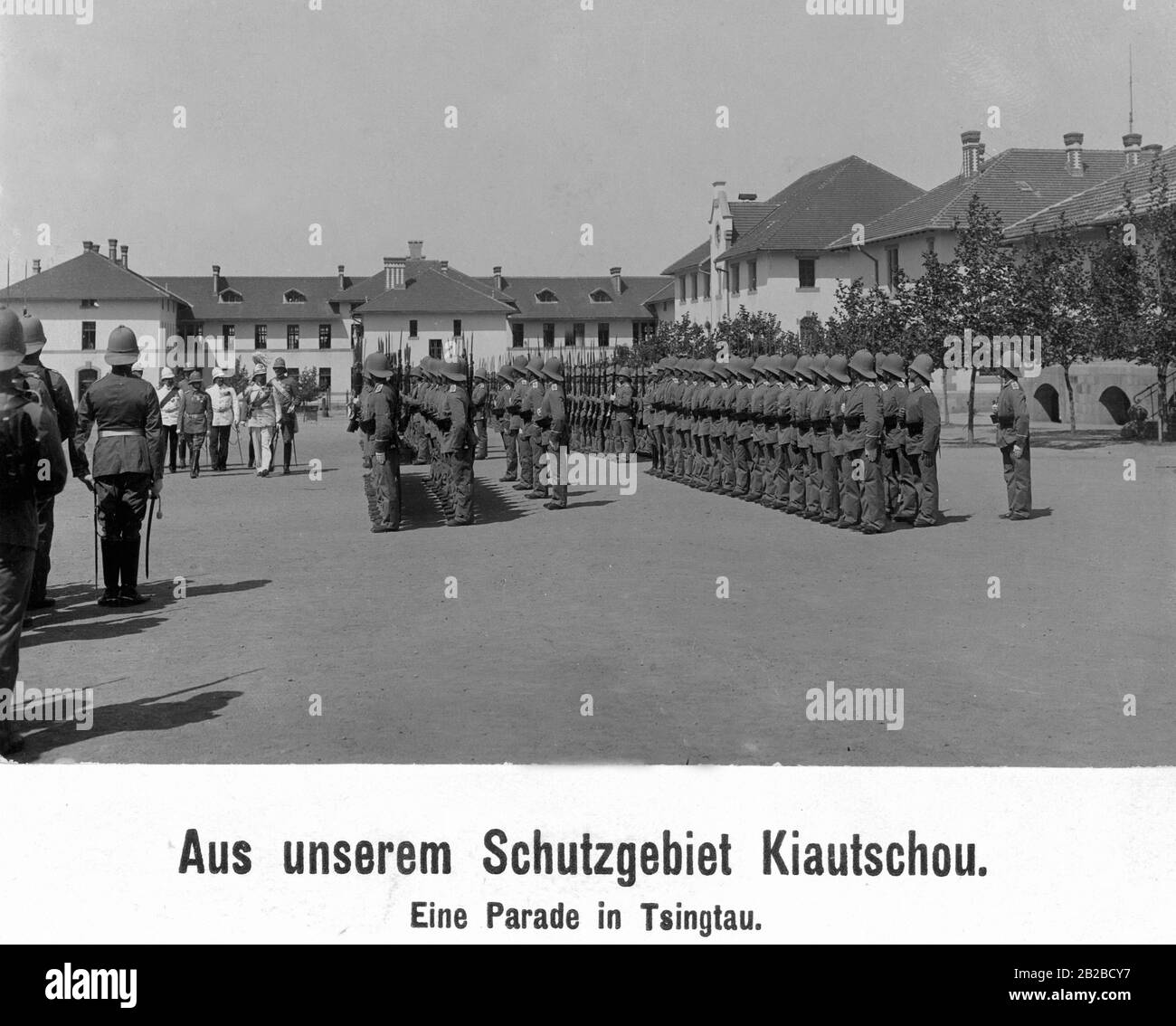 A German military parade in Tsingtau in the Kiautschou region. Stock Photo