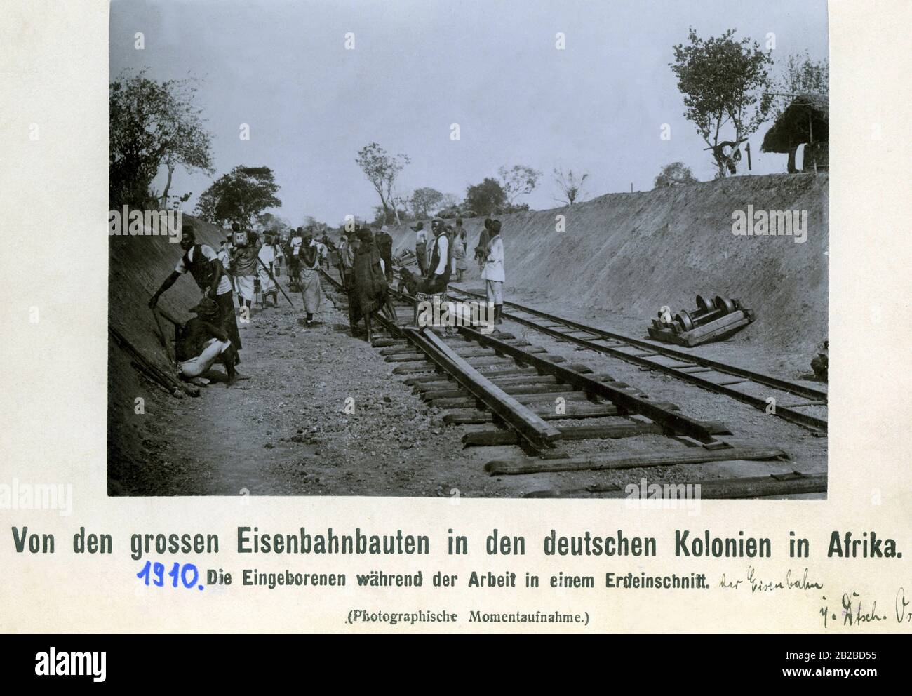 Locals working on the new railway line through German East Africa. Stock Photo