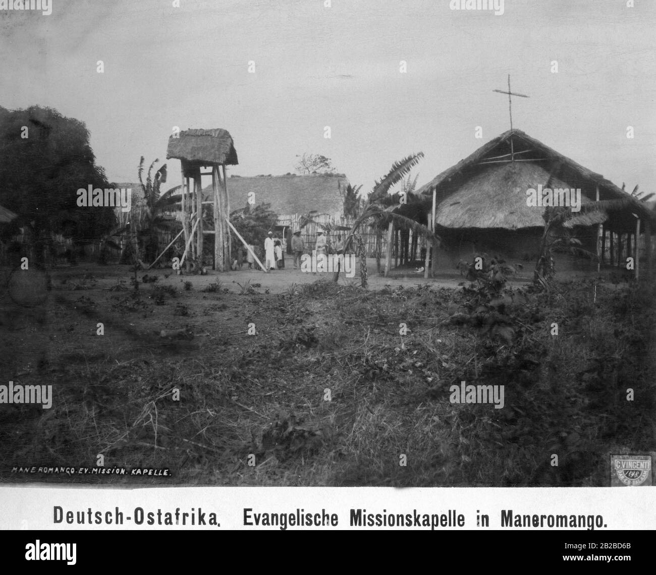 New construction of the Protestant mission station with church, school and bell tower in Maneromango in the former German East Africa. Stock Photo