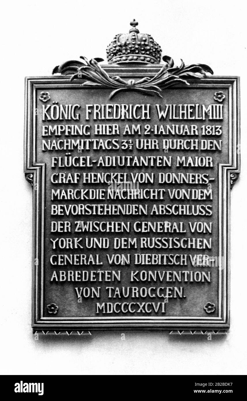 Commemorative plaque commemorating the Convention of Tauroggen, an armistice signed by General York of Wartenburg, on behalf of his Prussian troops, and the Russian general Diebitsch, as part of which he commits to neutrality of the Prussian auxiliary troops in the army of Napoleon I. It hangs in today's Taurage in Lithuania. Stock Photo