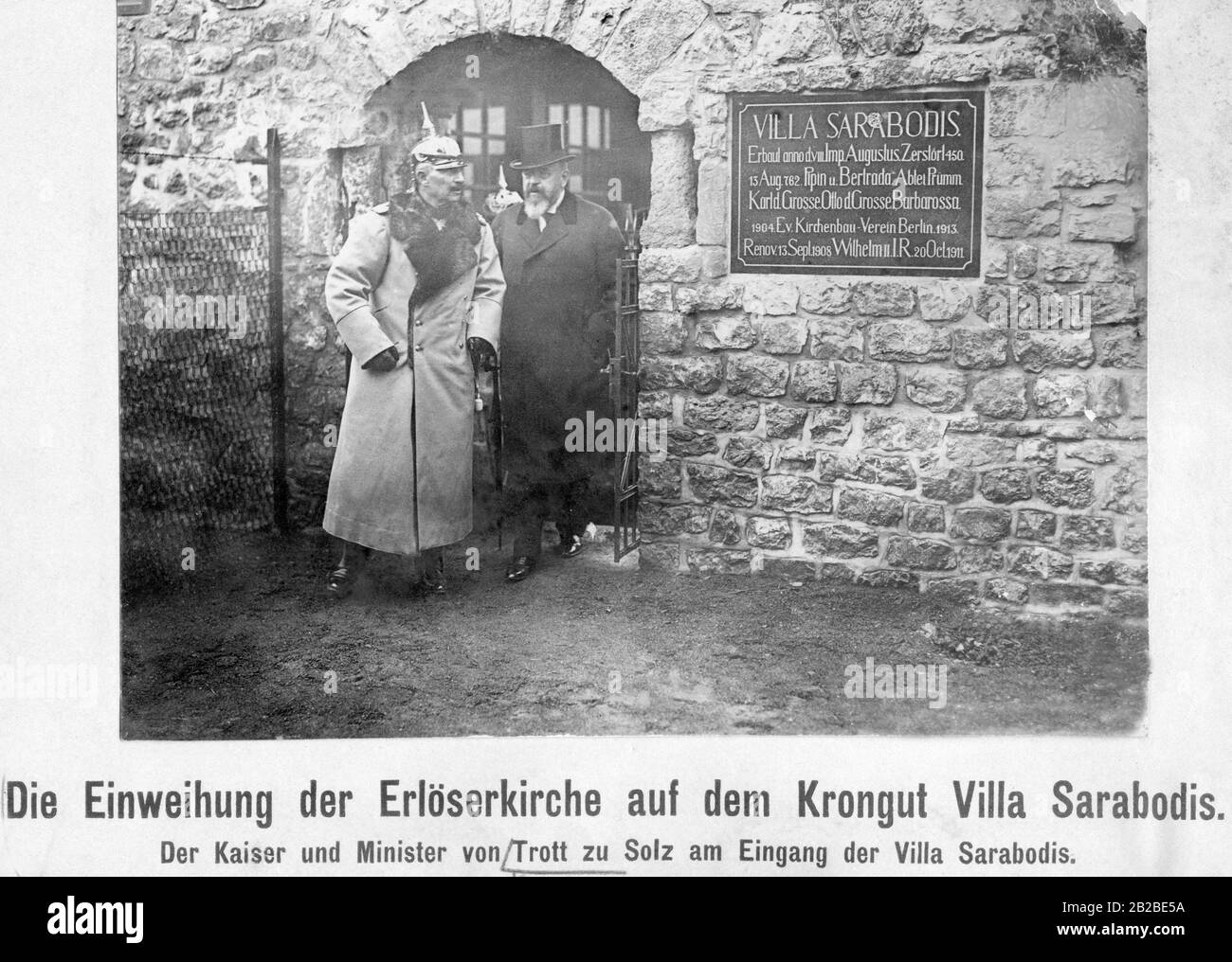 Kaiser Wilhelm II (left) leaves Villa Sarabodis together with the Minister of Culture August von Trott zu Solz. On October 15, 1913, the Church of the Redeemer was inaugurated on the then crown estate Villa Sarabodis in Gerolstein. Stock Photo