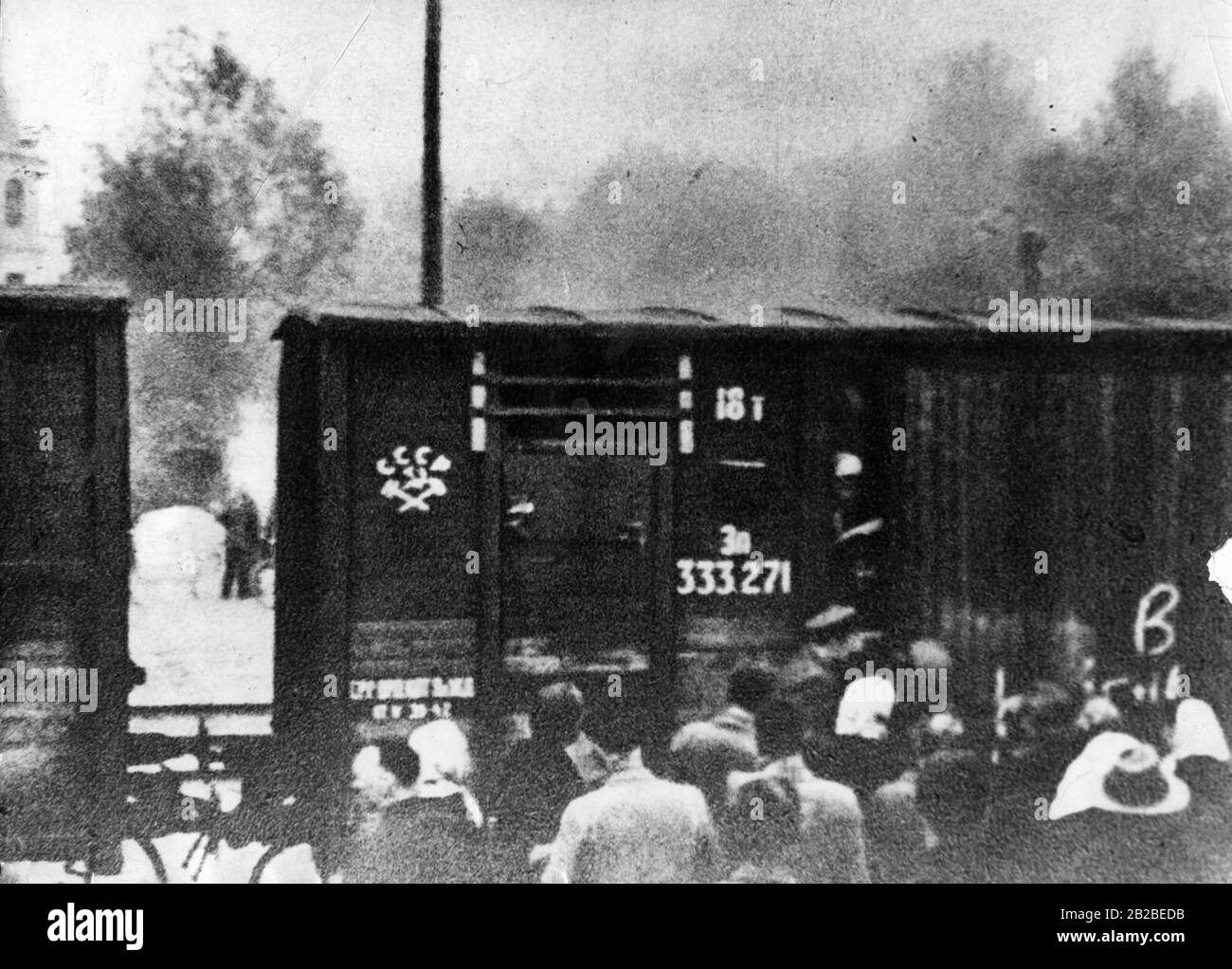 Soviet forced laborers are taken to labor camps in Siberia in overcrowded freight trains. Undated photo, probably in the 1930s. Stock Photo