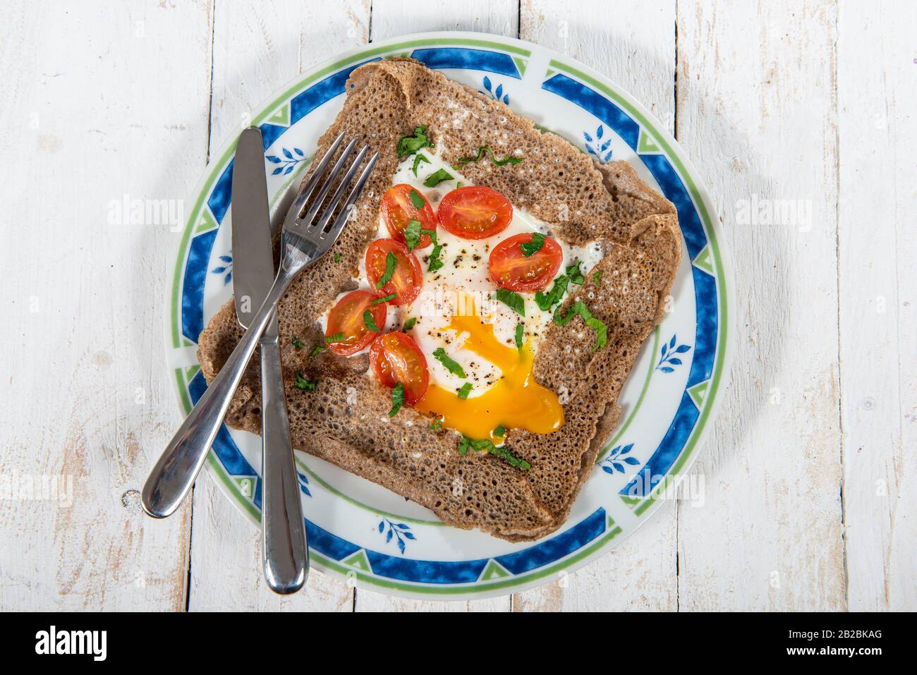aa Breton crepe with egg and tomatoes Stock Photo