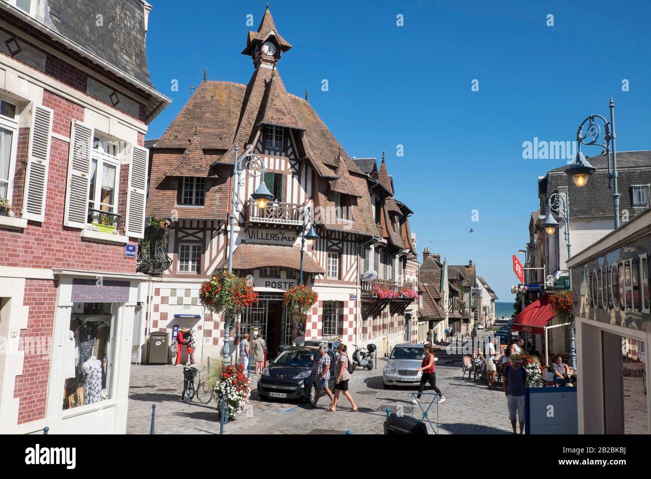 Town centre of Villers-sur-Mer: villas along the 'Cote Fleurie' coastal area. On the left, the post-office Stock Photo