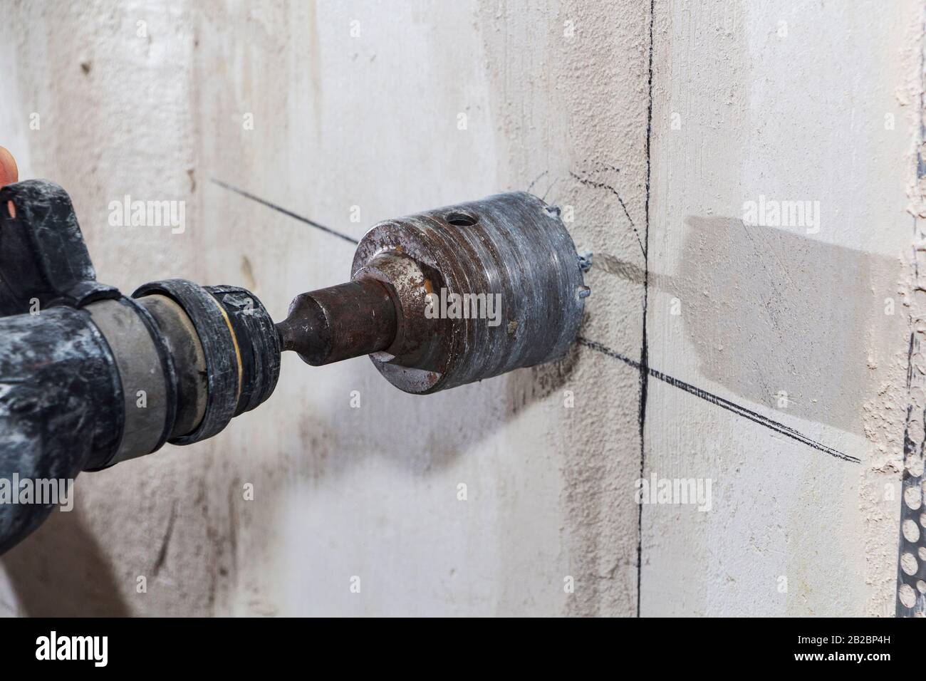 drill hole for electrical outlet outlet, special power tool drill Stock