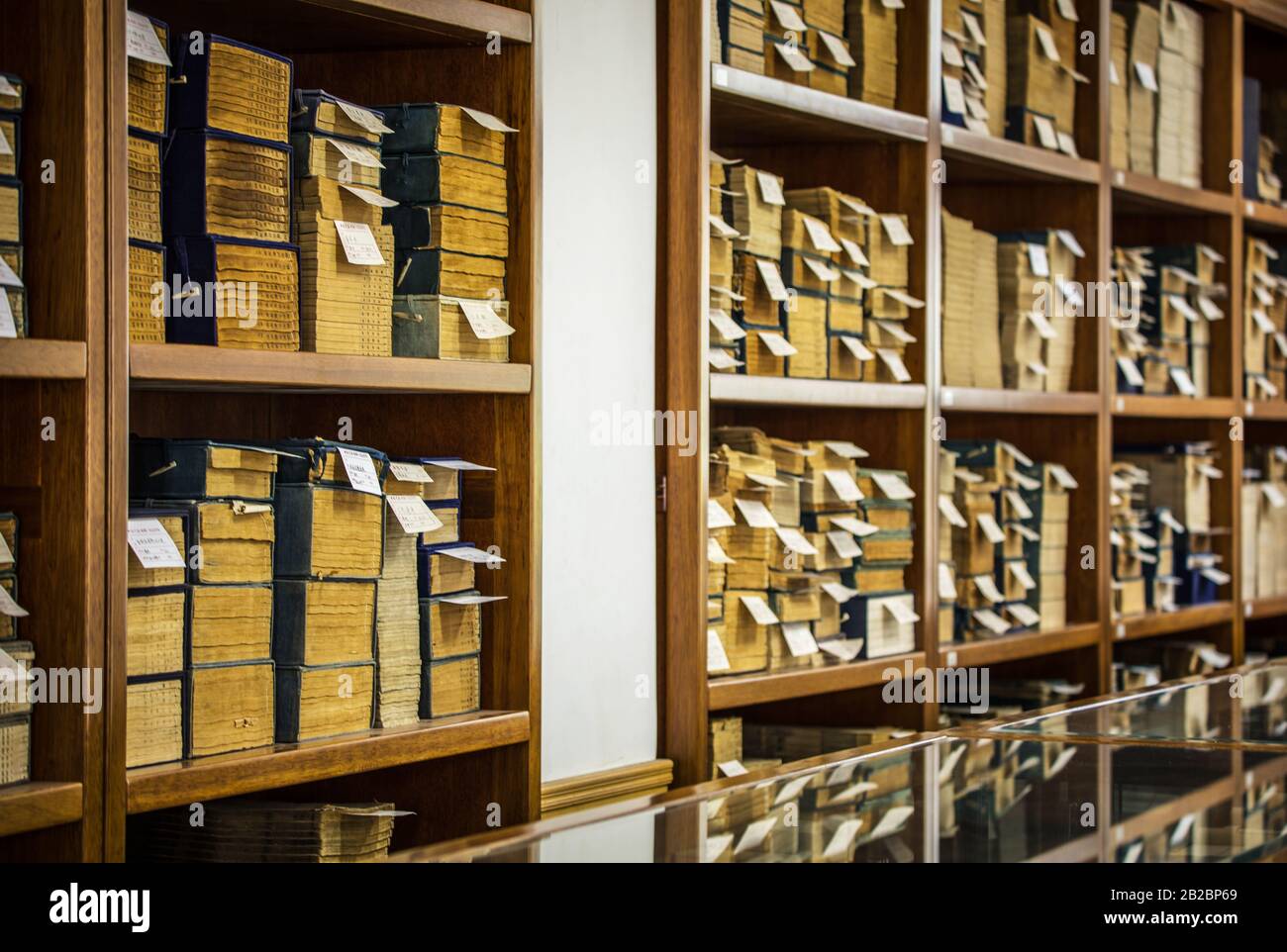 BEIJING, СHINA JUNE 01, 2019 Traditional Chinese library with shelves of old and modern books