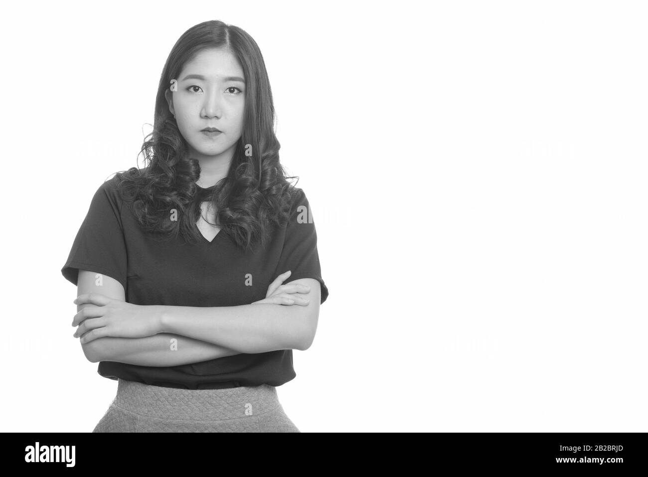 Portrait of young beautiful Asian woman in black and white Stock Photo ...