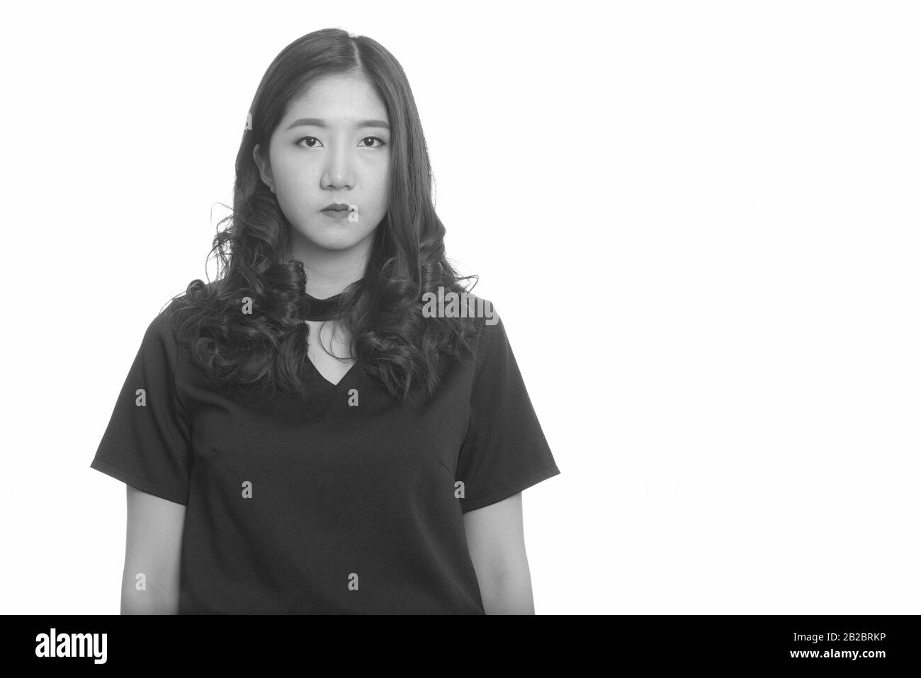 Portrait of young beautiful Asian woman in black and white Stock Photo ...