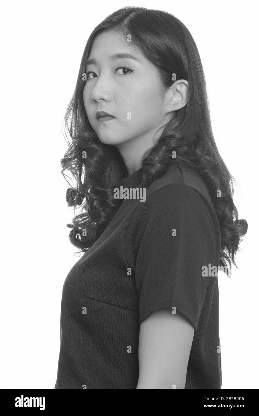 Portrait of young beautiful Asian woman in black and white Stock Photo ...