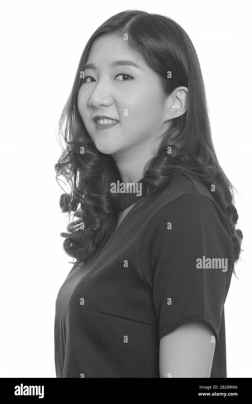 Portrait of young beautiful Asian woman in black and white Stock Photo ...