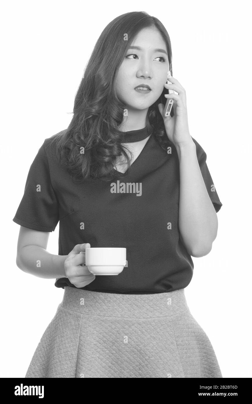 Portrait of young beautiful Asian woman in black and white Stock Photo ...