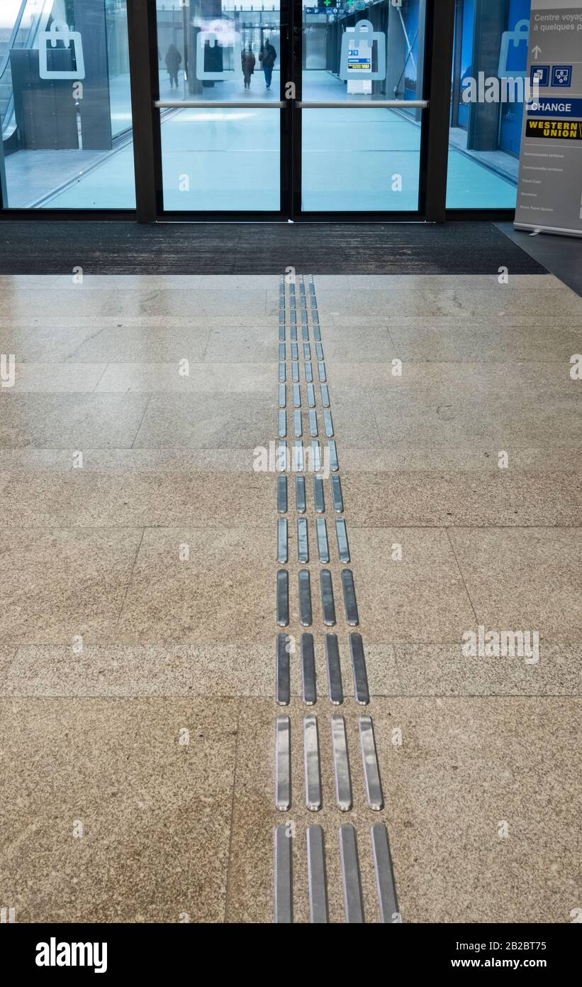 Stainless steel tactile ground surface indicators set in marble hires