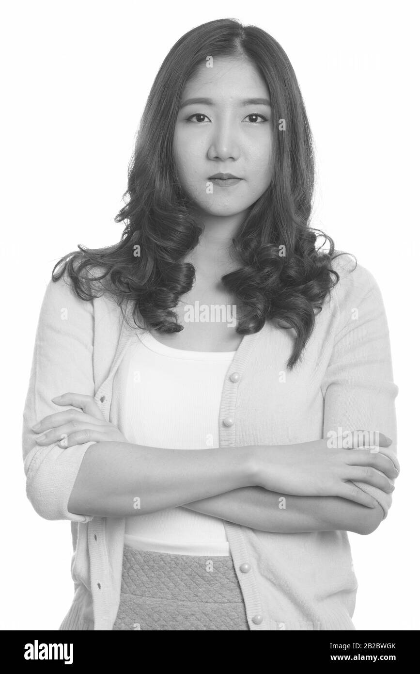 Portrait of young beautiful Asian woman in black and white Stock Photo ...