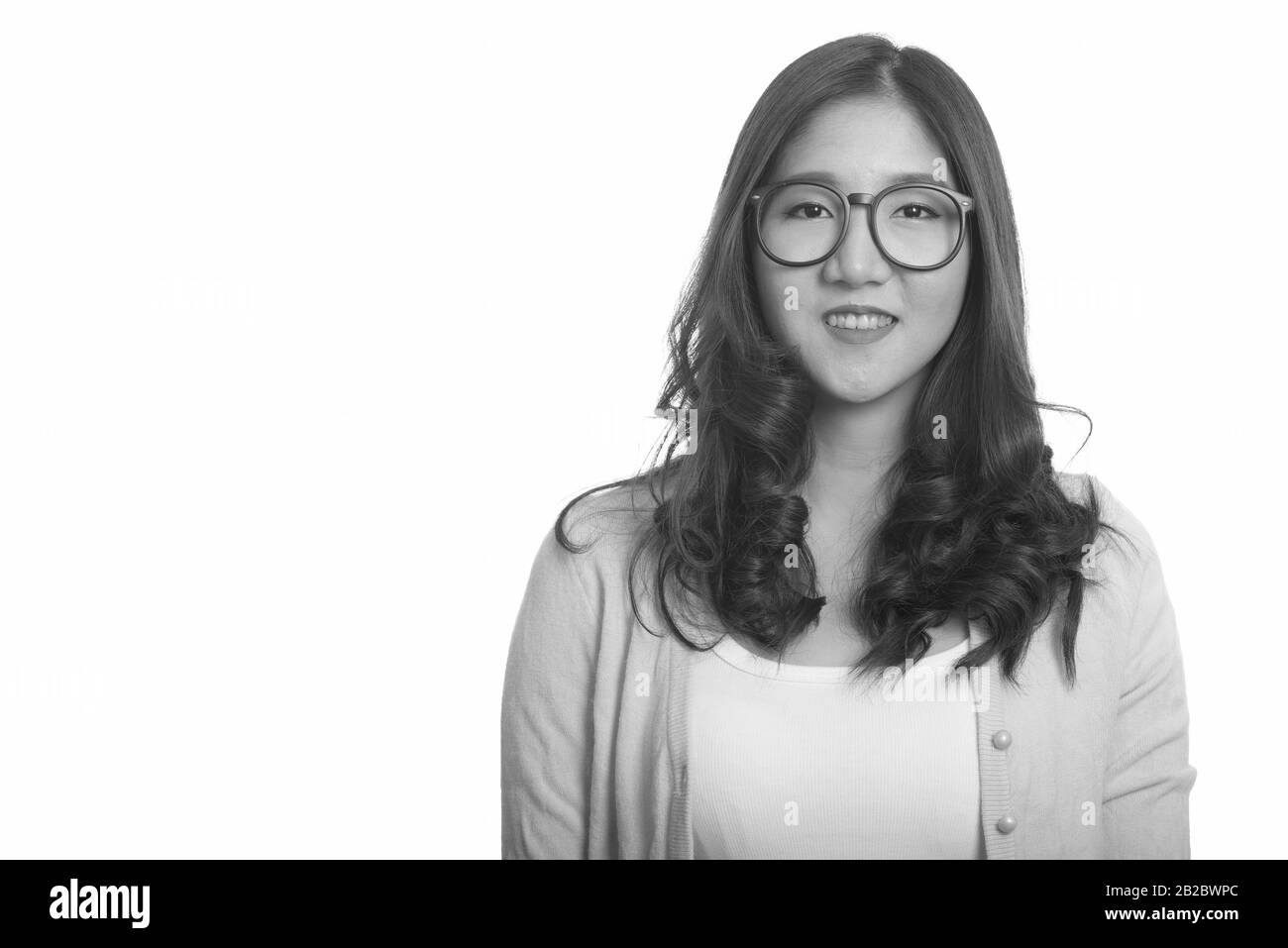 Portrait of young beautiful Asian woman in black and white Stock Photo ...