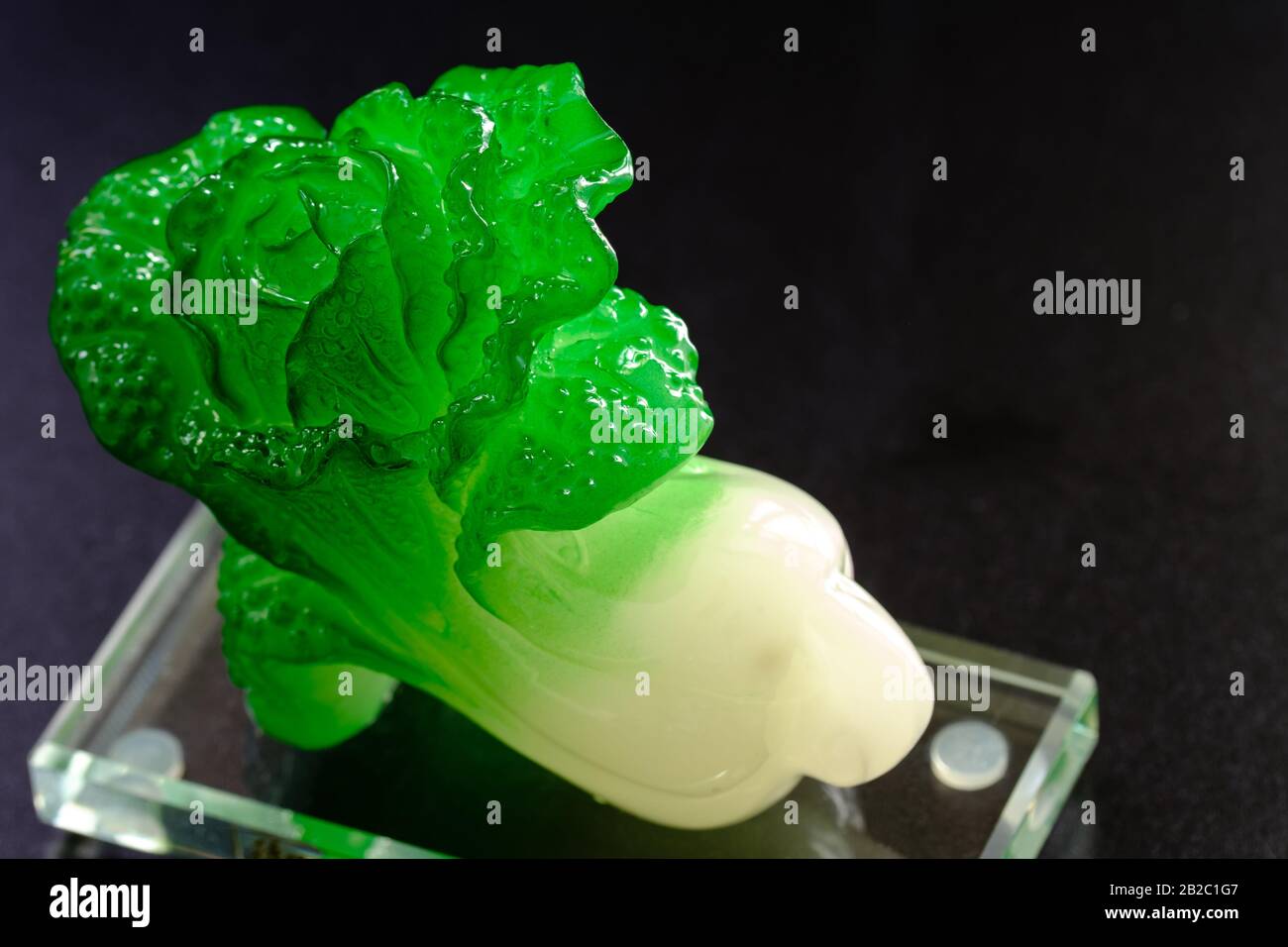 Singapore29 FEB 2020Chinese cabbage jade carving, isolated on black