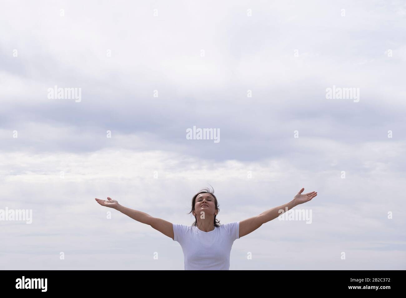 Sun arms raising beach hi-res stock photography and images - Alamy