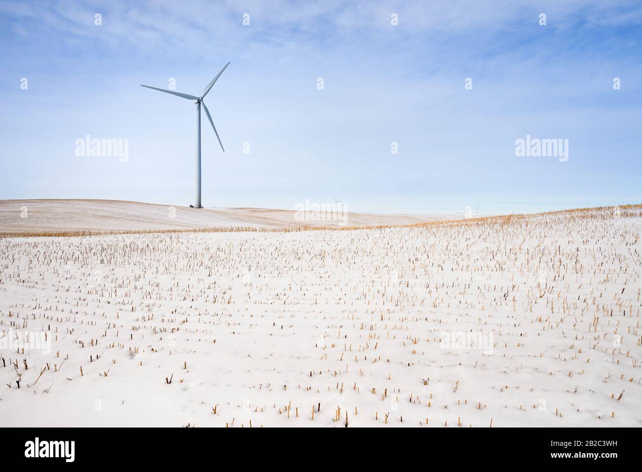 Winter view of wind turbines in an agricultural field near the town of Rosebud, Alberta, Canada Stock Photo