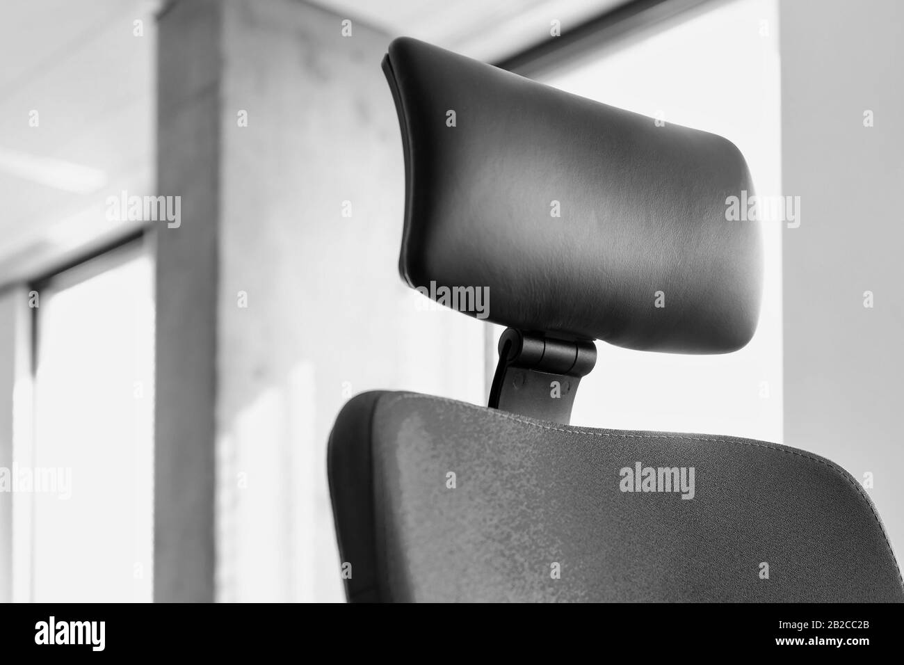 Black and white photo of chair in office Stock Photo Alamy