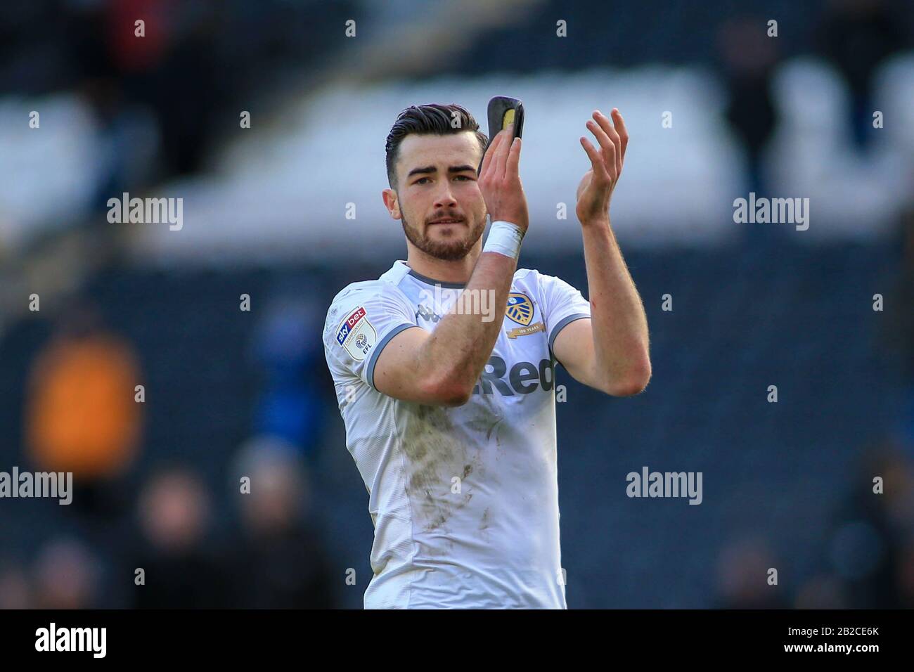 29th February 2020, KCOM Stadium, Hull, England; Sky Bet Championship, Hull City v Leeds United : Jack Harrison (22) of Leeds United thanks the Leeds travelling fans after the final whistle Stock Photo