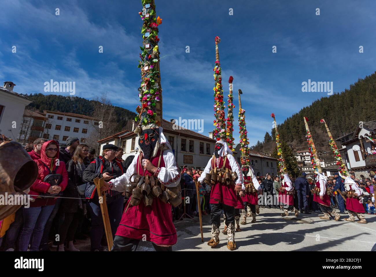 Shiroka Laka, Bulgaria - March 01, 2020: Masquerade festival in Shiroka Laka Bulgaria. People with a mask called Kukeri dance and perform to scare Stock Photo