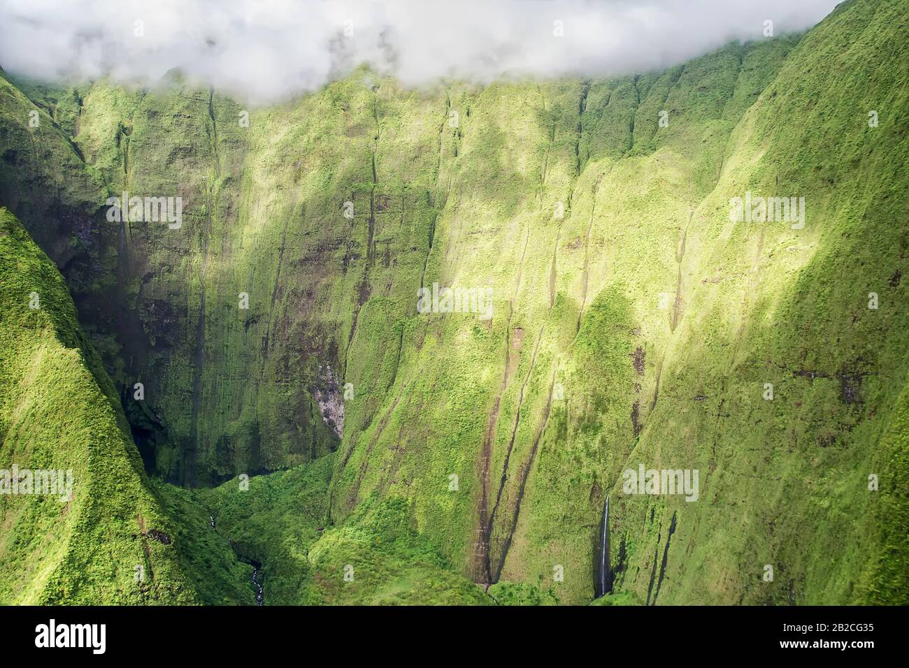 Kauai, Hawaii: Aerial view of the 'Wall of Tears' in the crater of Mount Waialeale (one of the rainiest spots on earth) Stock Photo