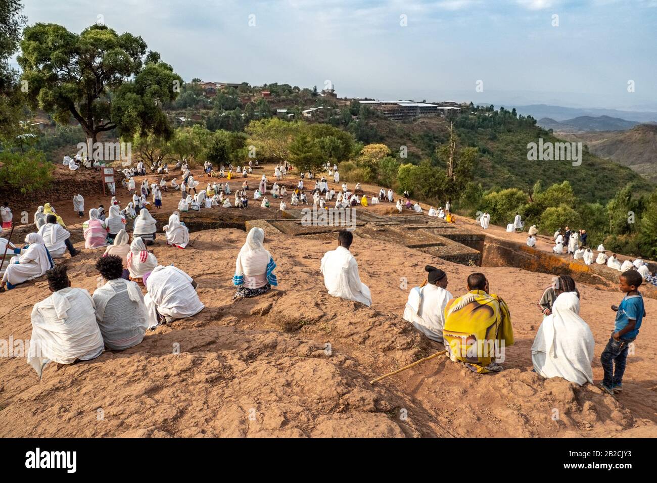 Morning mass, religious service, at Saint George stone church, one of eleven rock-hewn monolithic churches in Lalibela, a city in the Amhara Region Stock Photo