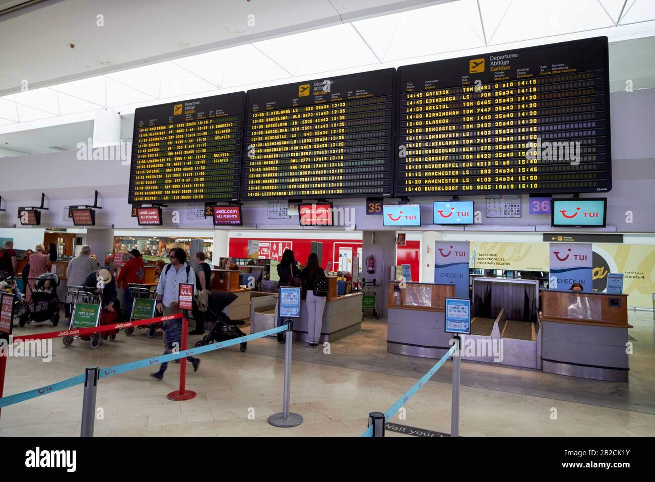 check in desks with departures board in terminal t1 arricife cesr manrique-Lanzarote airport canary islands spain Stock Photo