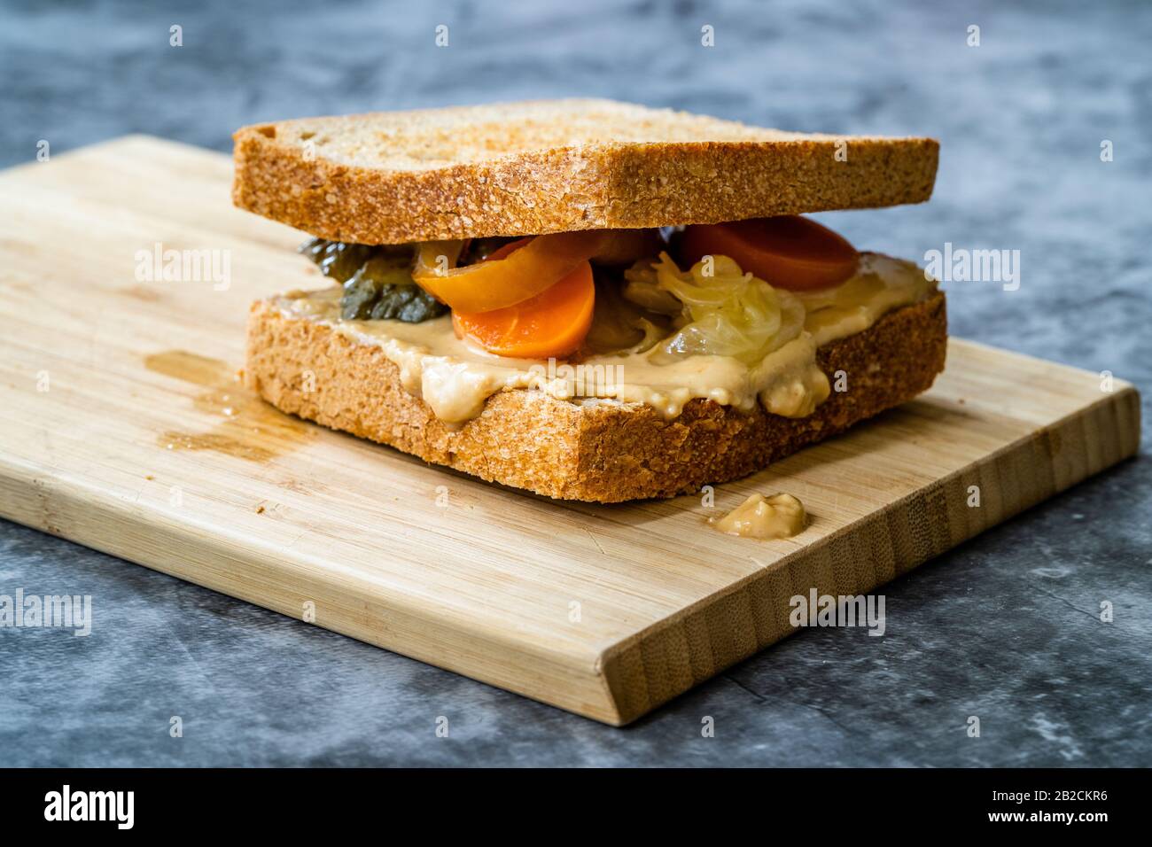 Organic Healthy Homemade Peanut Butter And Pickle Sandwich On Wooden Board Ready To Eat Stock Photo Alamy
