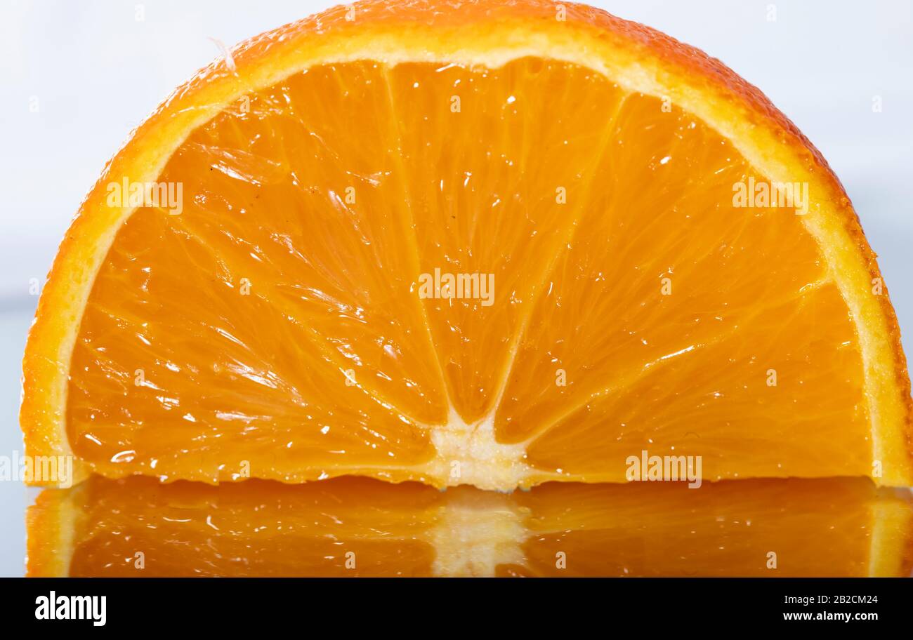 Orange fruit half slice close up hi-res stock photography and images ...
