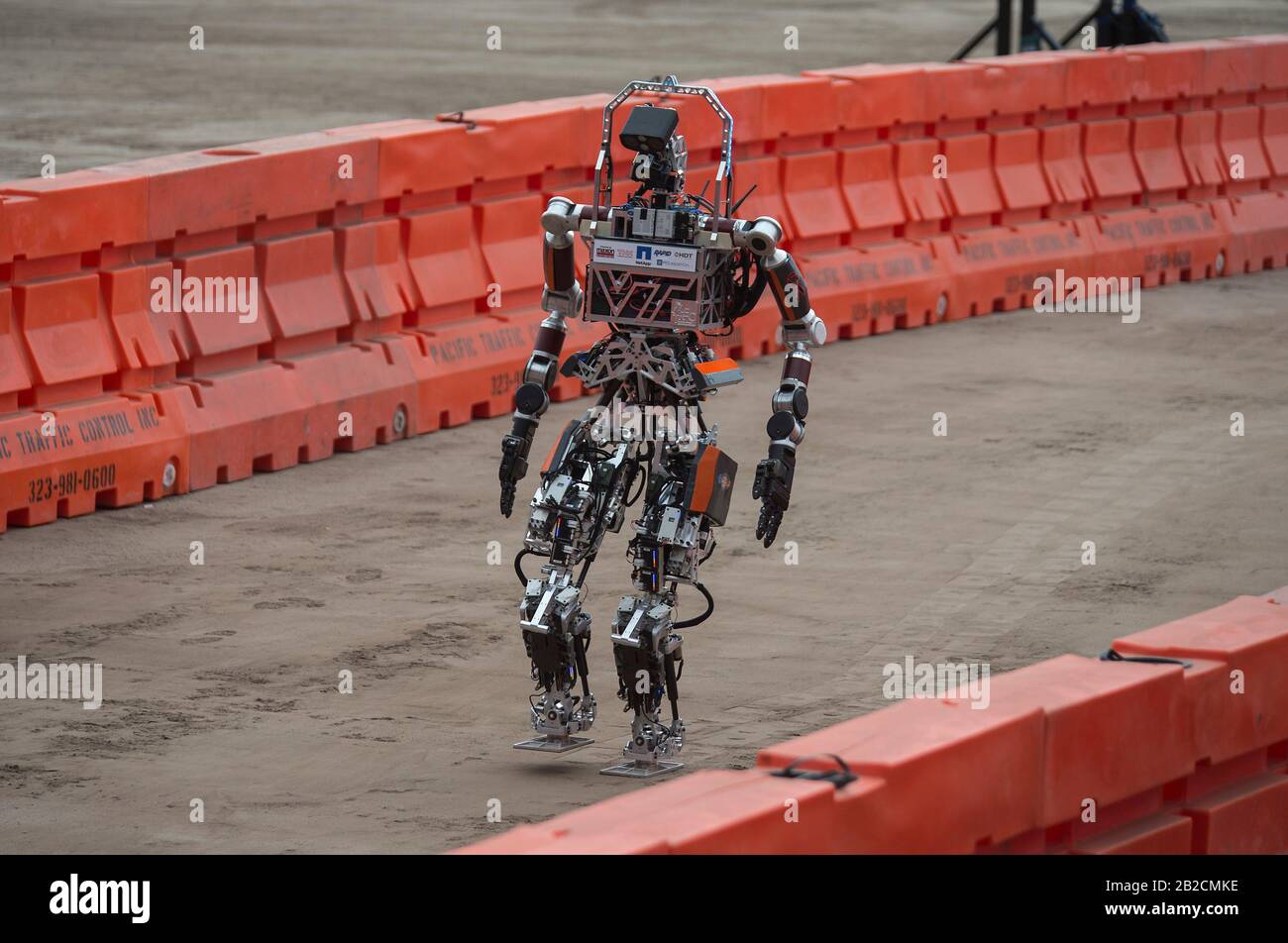 ESCHER, short for Electric Series Compliant Humanoid for Emergency Response, walks independently on two feet during the Defense Advanced Research Projects Agency Robotics Challenge June 6, 2015 in Pomona, California. The robot was designed, fabricated and assembled by engineering students at Virginia Tech. Stock Photo