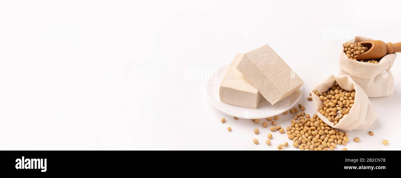 Meat substitute. Pressed firm white tofu blocks Stock Photo Alamy