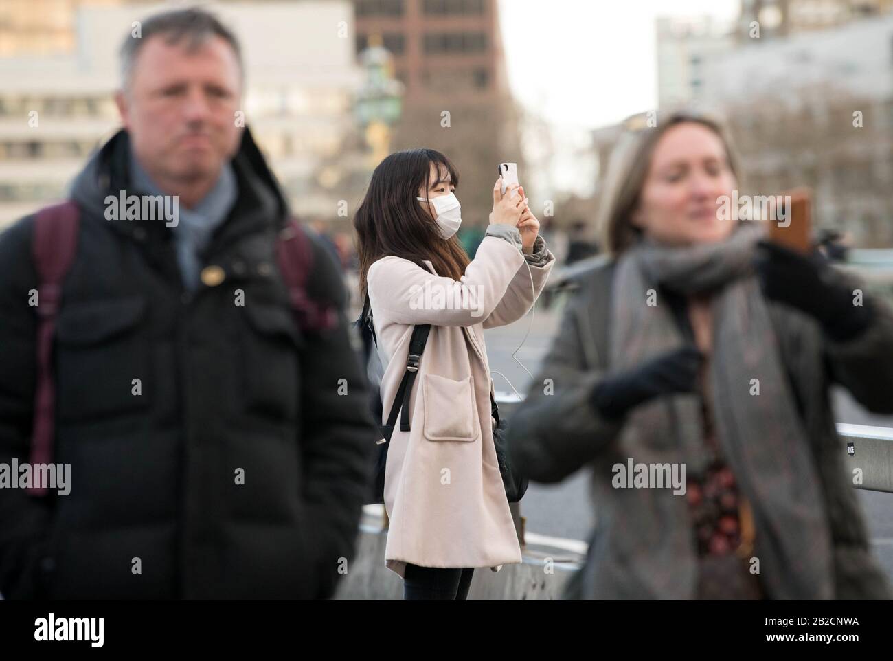 A woman wearing a face mask in London, as Shadow Health Secretary