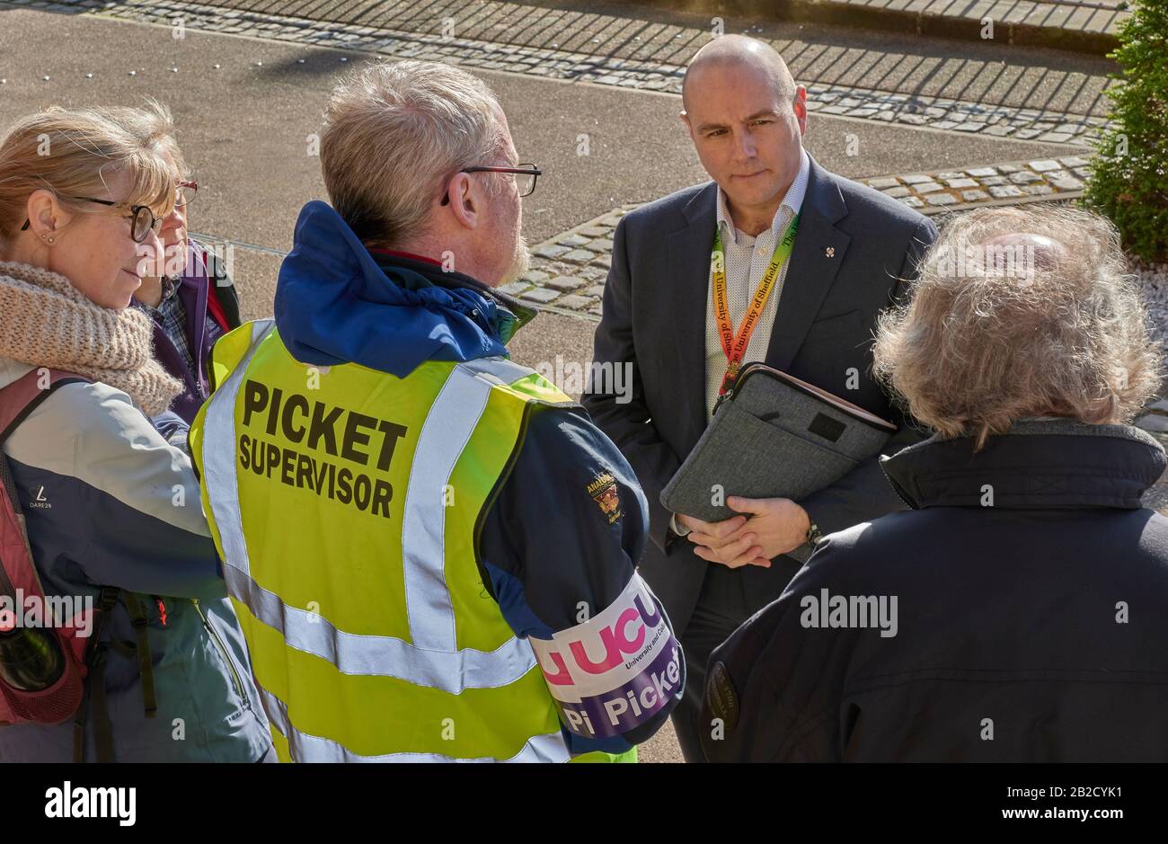 Ian Wright (suited), Deputy Director of Human Resources, University of