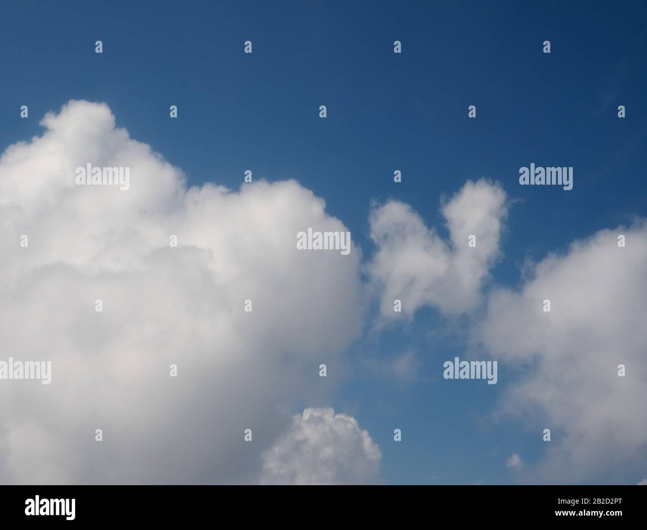 blue sky with clouds seen from plane useful as a background Stock Photo ...