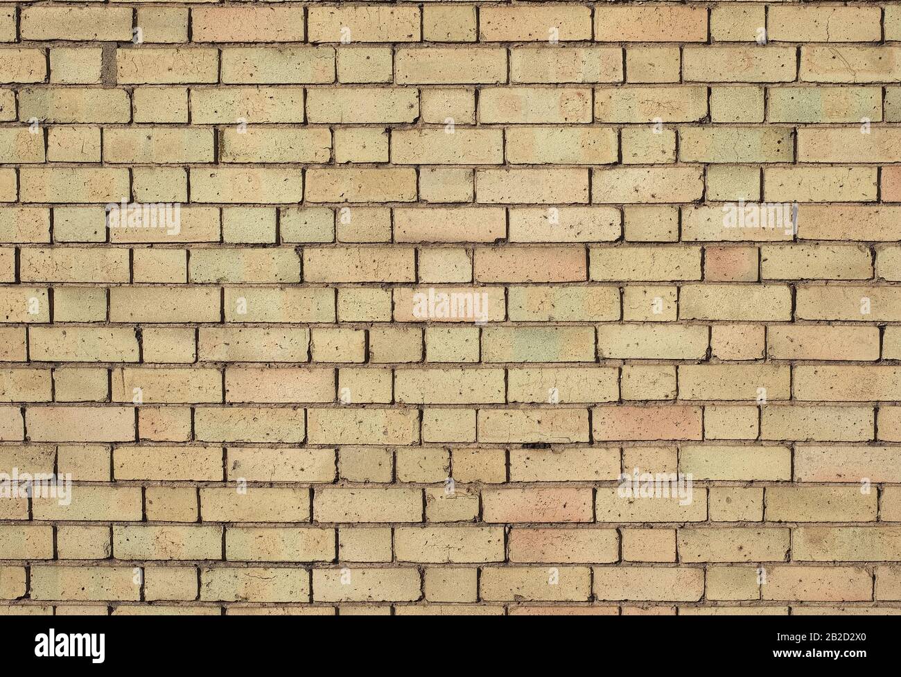 yellow brick wall texture useful as a background Stock Photo - Alamy