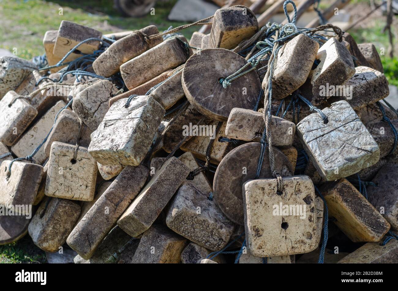 A pile of floats for commercial fishing nets. Lots of old floats outdoors.  Floats square, round and rectangular in the sun. Industrial fishing. Select  Stock Photo - Alamy