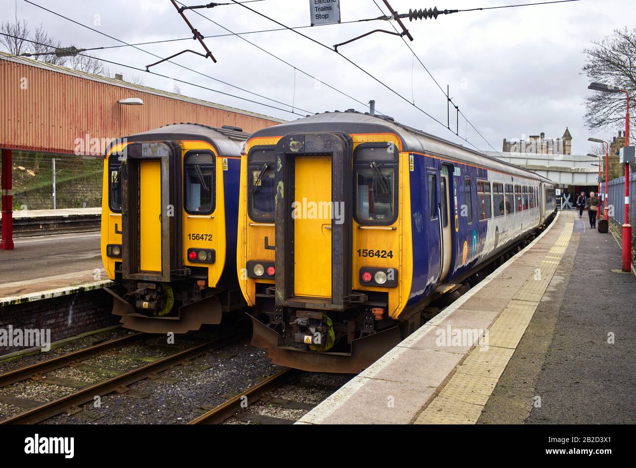 Class 156 Super Sprinter diesel multiple unit trains at Lancaster station in Northern trains livery Stock Photo